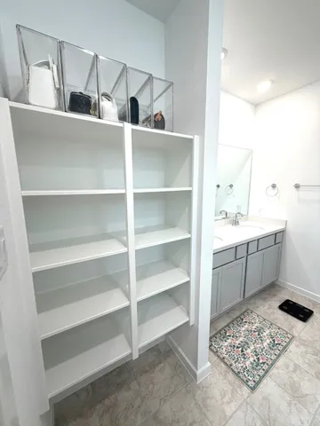 a view of cabinets and window