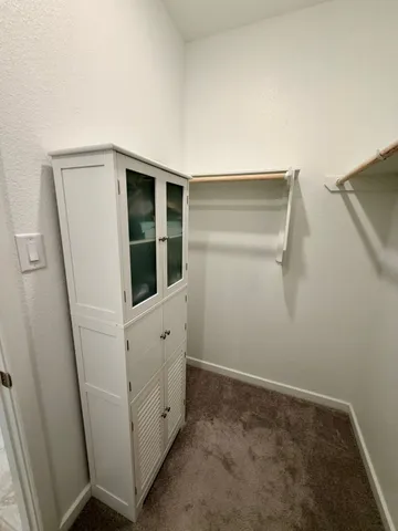 an empty room with cabinet