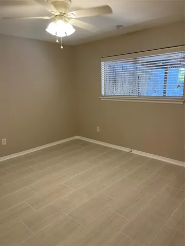 a view of empty room with a window