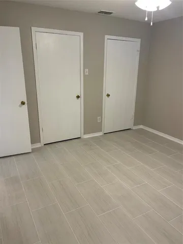 an empty room with a door