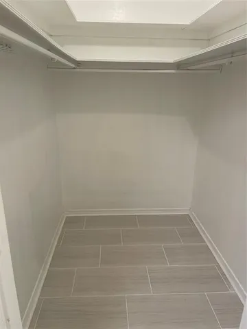 a view of a room with white door