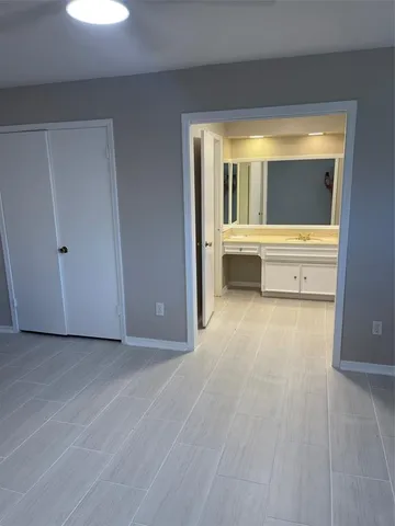 a view of bathroom with bathtub and shower