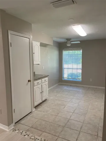 a view of a kitchen with a sink