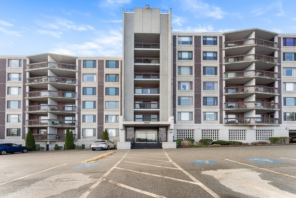 1500 Worcester Road, Unit 830 Framingham, MA 01702 - Photo 22 of 23 a front view of a building with a street