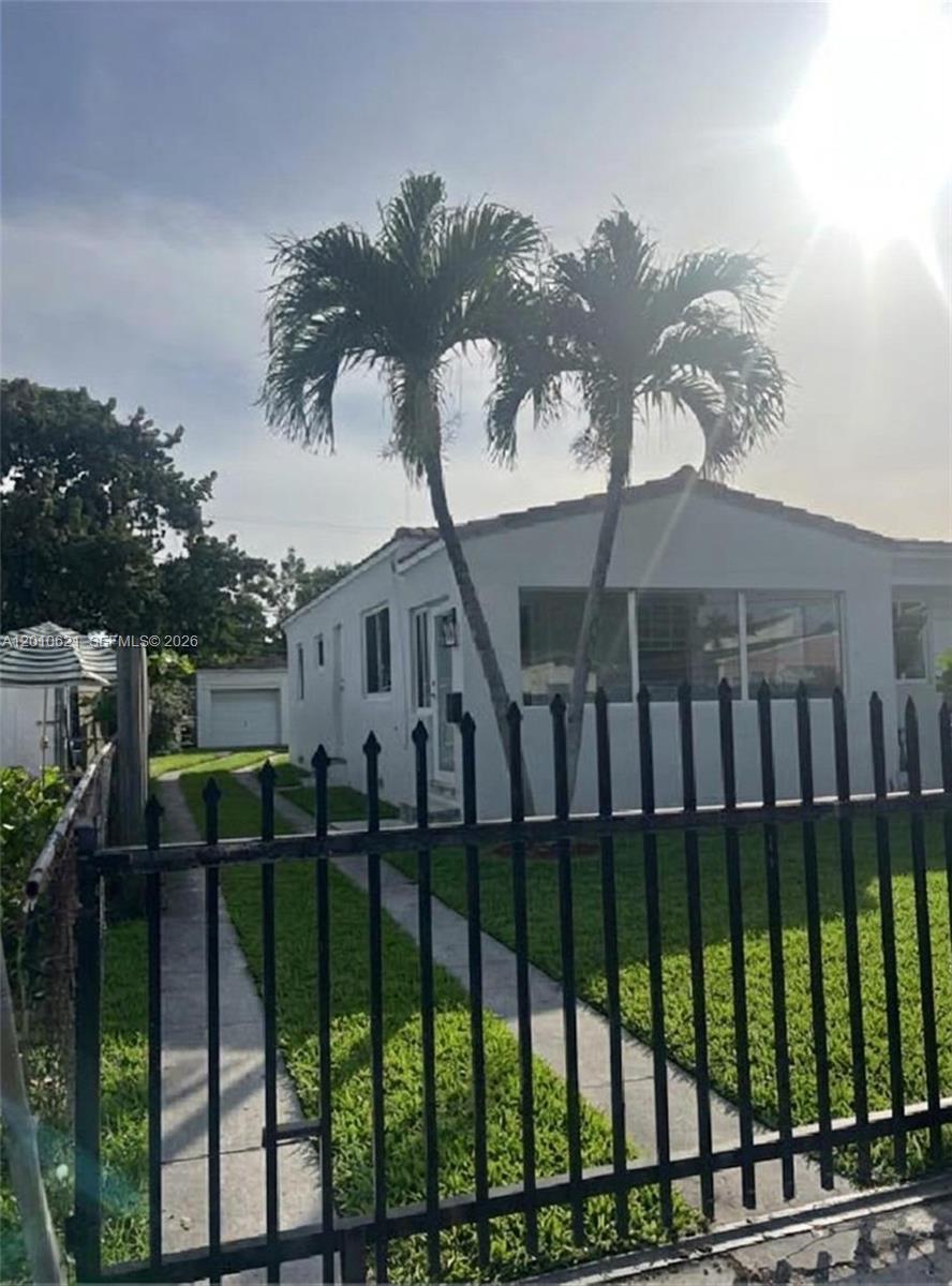 2412 Southwest 11th Street, Unit 1 Miami, FL 33135 - Photo 12 of 12 a view of a wrought iron fences in front of house