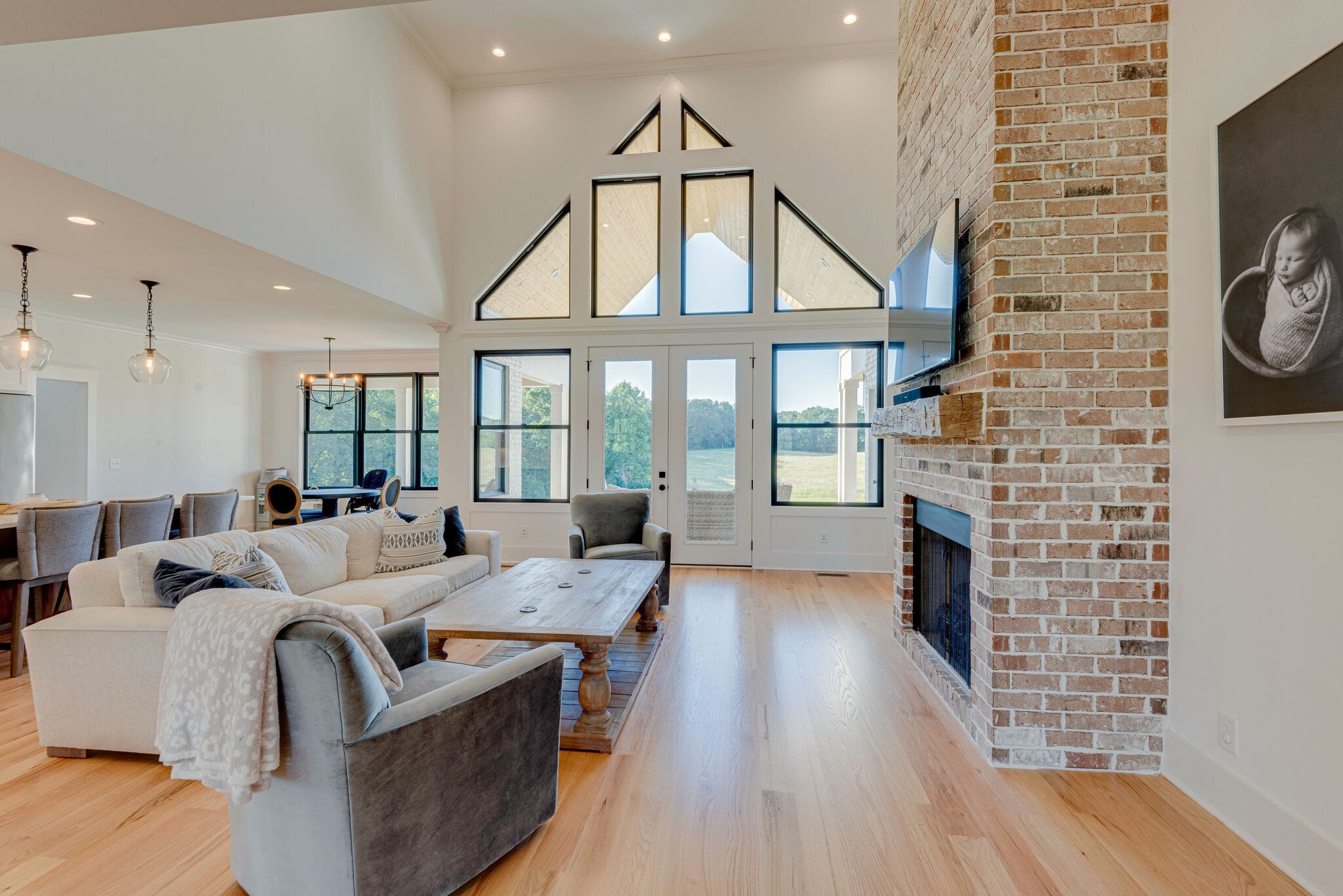 1386 Eno Road Dickson, TN 37055 - Photo 12 of 59 a living room with fireplace furniture and a wooden floor
