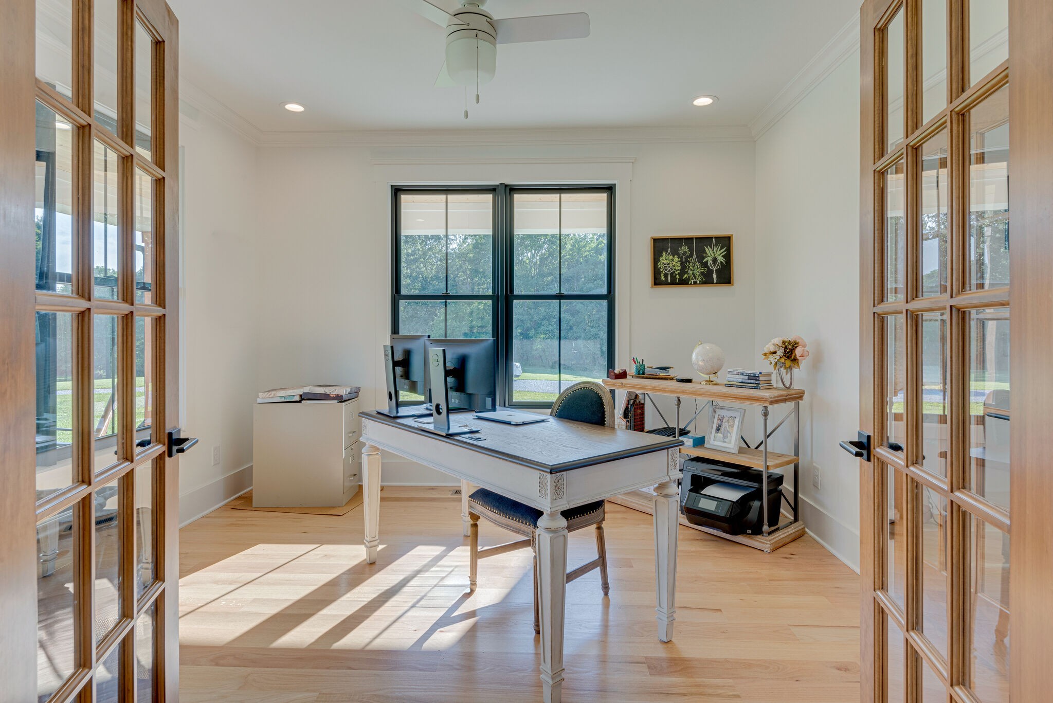 1386 Eno Road Dickson, TN 37055 - Photo 13 of 59 a view of a workspace with furniture and a window