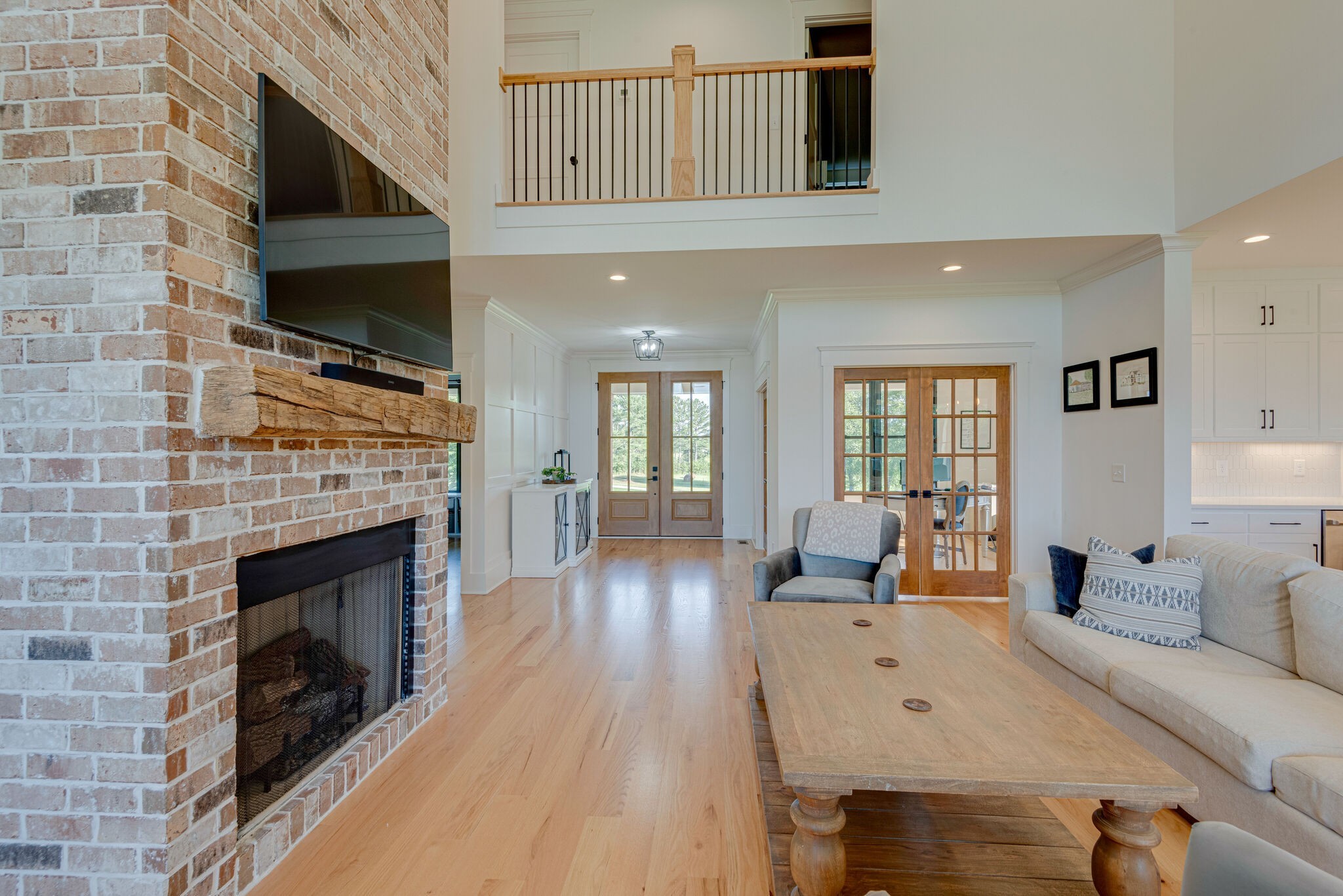 1386 Eno Road Dickson, TN 37055 - Photo 14 of 59 a living room with furniture a fireplace and a flat screen tv