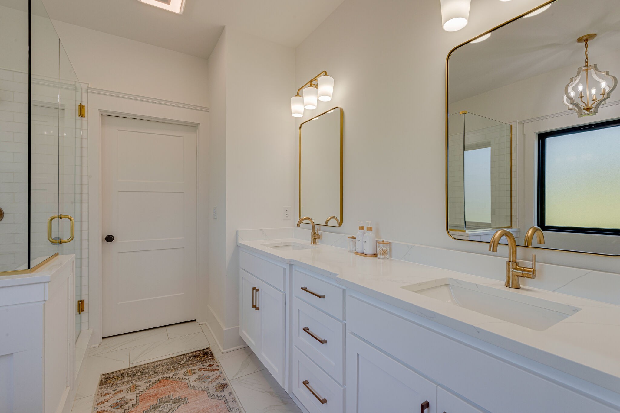 1386 Eno Road Dickson, TN 37055 - Photo 30 of 59 a bathroom with double vanity sink and a mirror