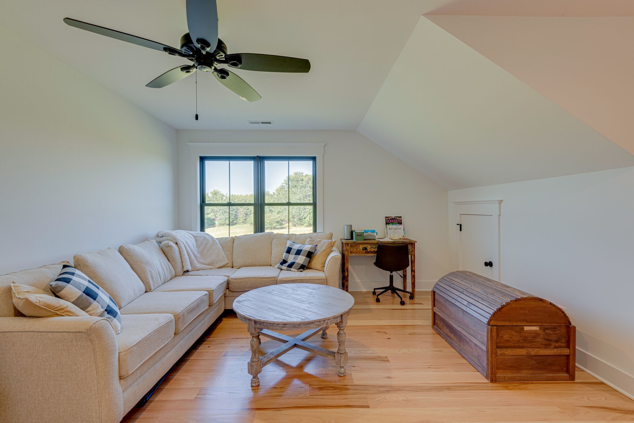1386 Eno Road Dickson, TN 37055 - Photo 31 of 59 a living room with furniture ceiling fan and a window