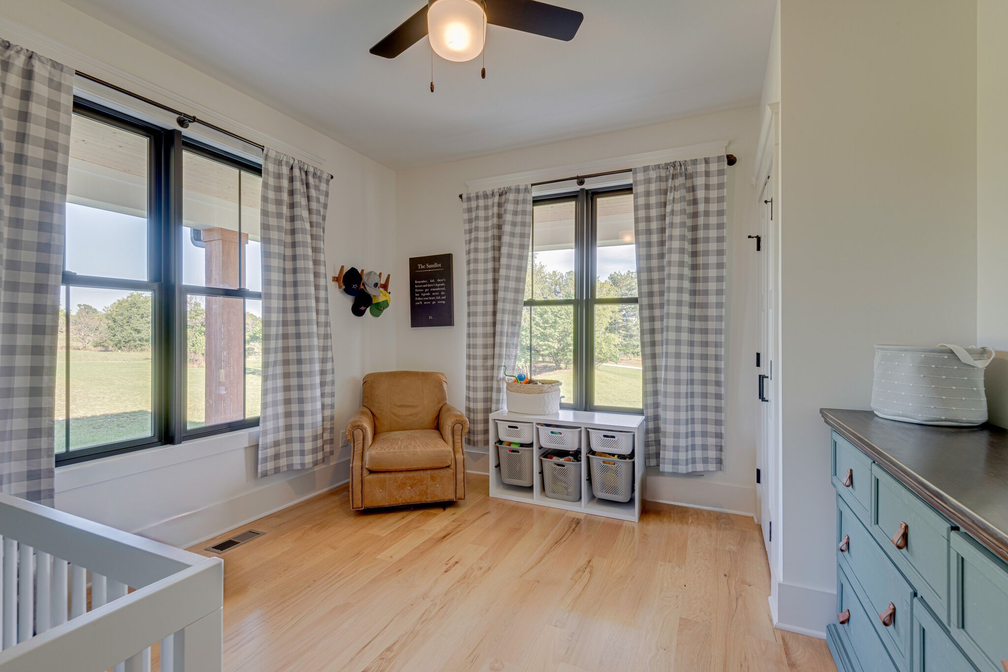 1386 Eno Road Dickson, TN 37055 - Photo 32 of 59 a living room with furniture and a large window