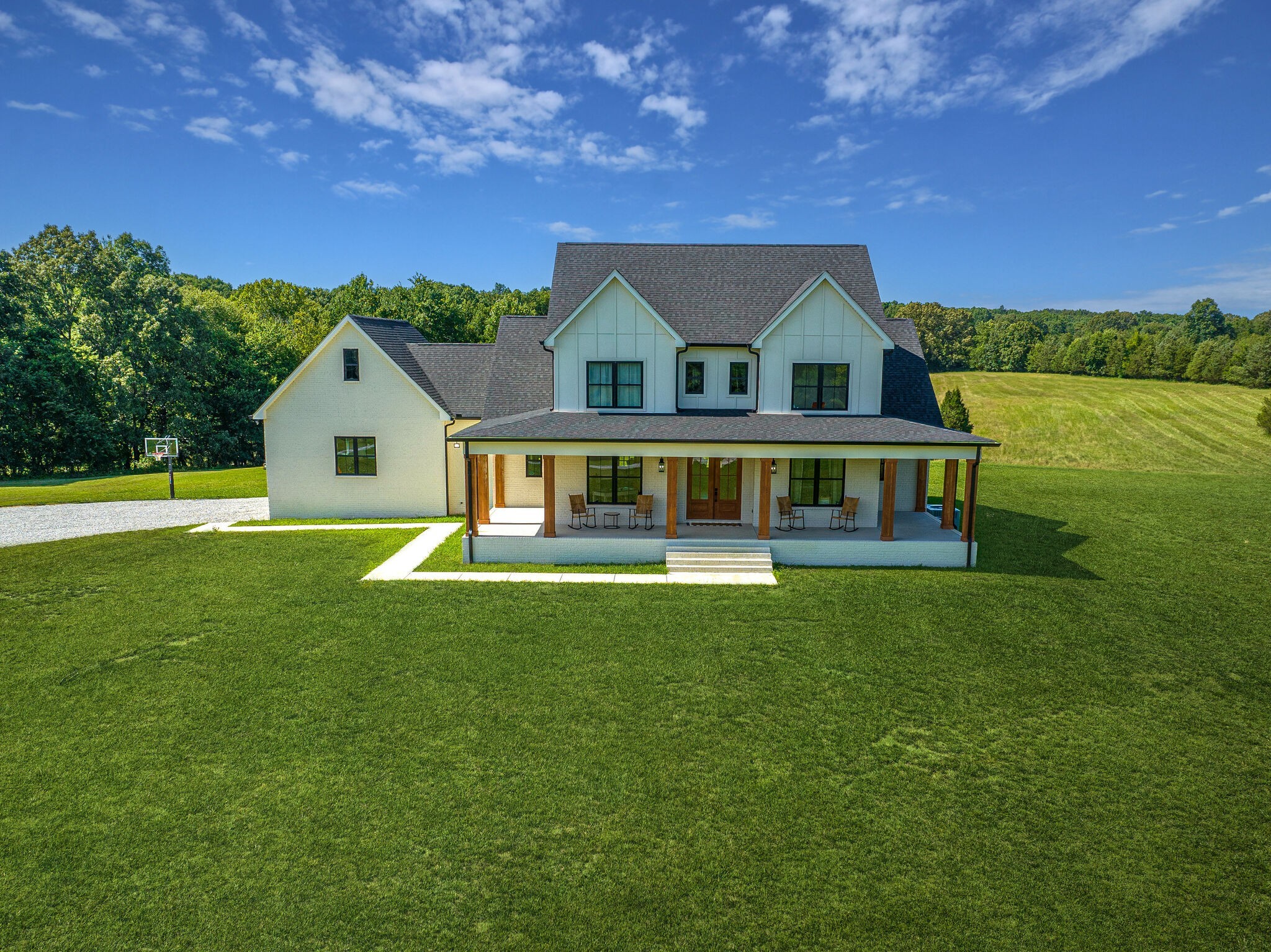 1386 Eno Road Dickson, TN 37055 - Photo 43 of 59 a front view of a house with a garden