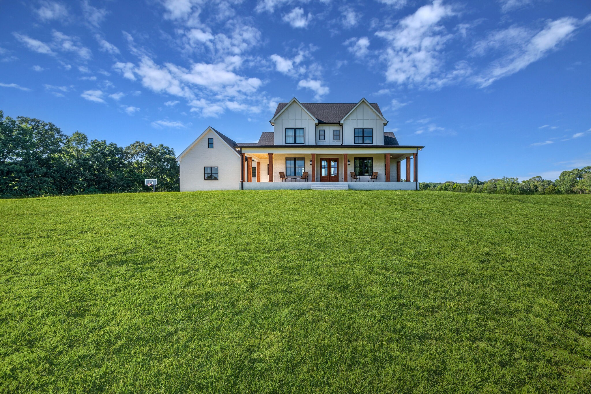 1386 Eno Road Dickson, TN 37055 - Photo 44 of 59 a front view of a house with a garden