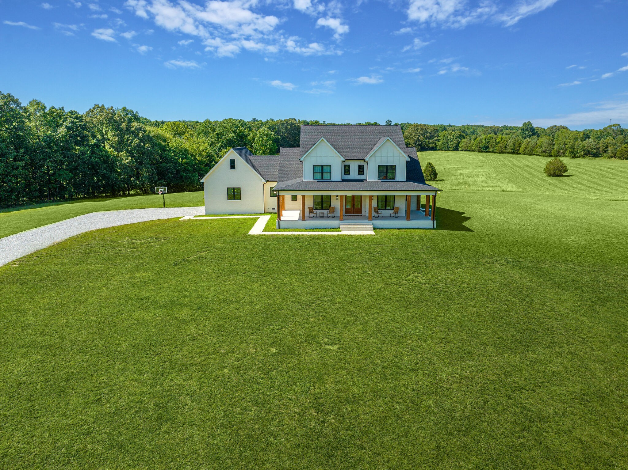 1386 Eno Road Dickson, TN 37055 - Photo 53 of 59 a front view of a house with a garden