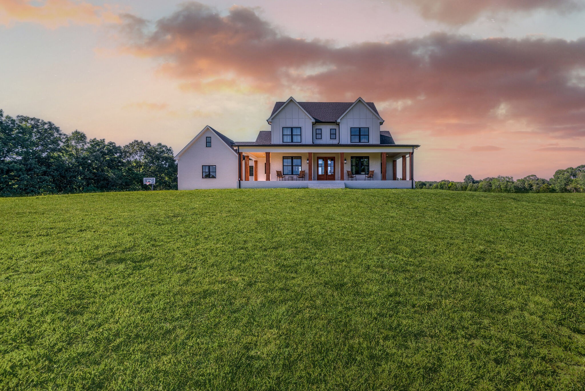 1386 Eno Road Dickson, TN 37055 - Photo 59 of 59 a view of a big house with a big yard and large trees