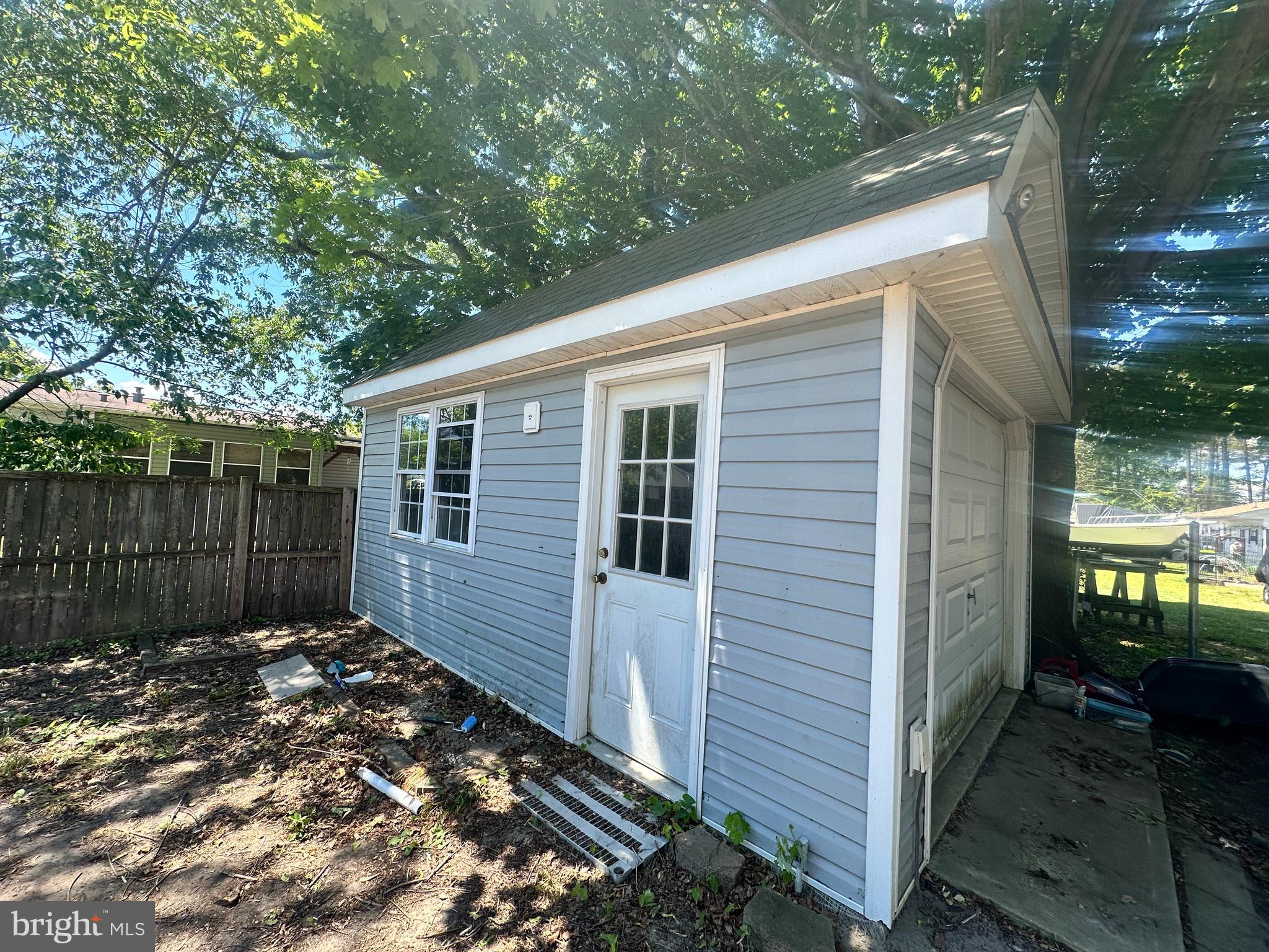 35390 Heron Road Millsboro, DE 19966 - Photo 24 of 25 a backyard of a house with lots of green space
