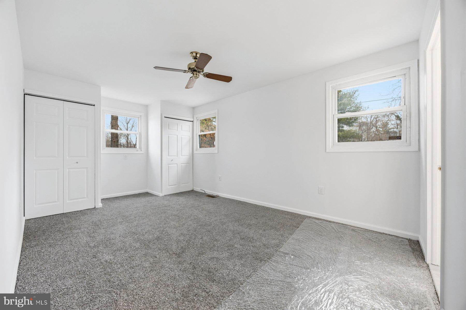 341 Dameron Street South Laurel, MD 20724 - Photo 14 of 32 a view of room with ceiling fan and window