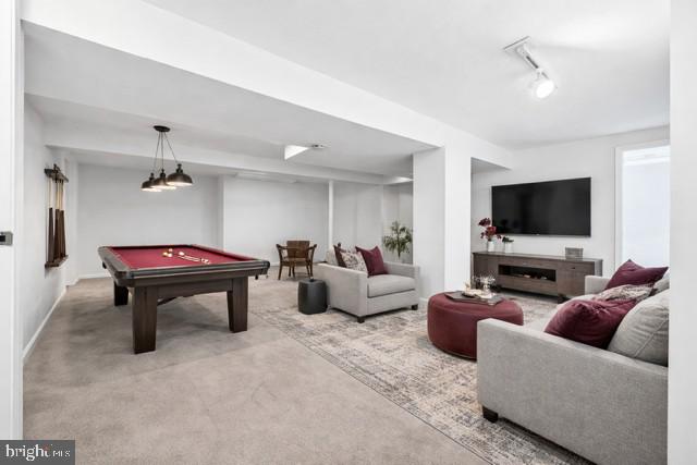 341 Dameron Street South Laurel, MD 20724 - Photo 22 of 32 a living room with furniture and a flat screen tv