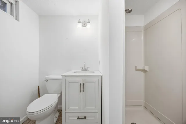 a view of a storage & utility room with a sink