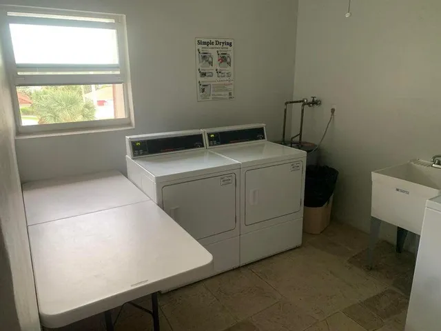 $1,900 | 2936 Lake Shore Drive, Unit 203, Riviera Beach, FL 33404