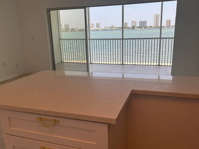 wooden floor in an empty room and a window