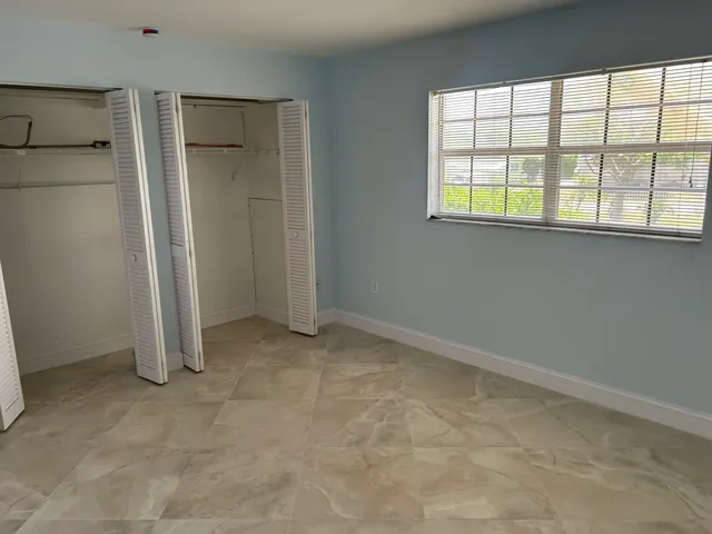 a bathroom with a bathtub and a toilet