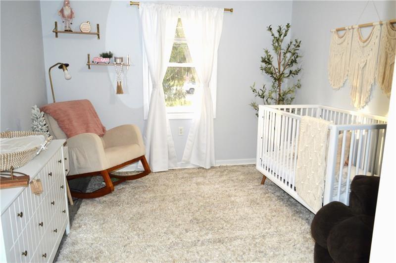 106 Meadowview Drive Renfrew, PA 16053 - Photo 11 of 17 a living room with furniture and a window