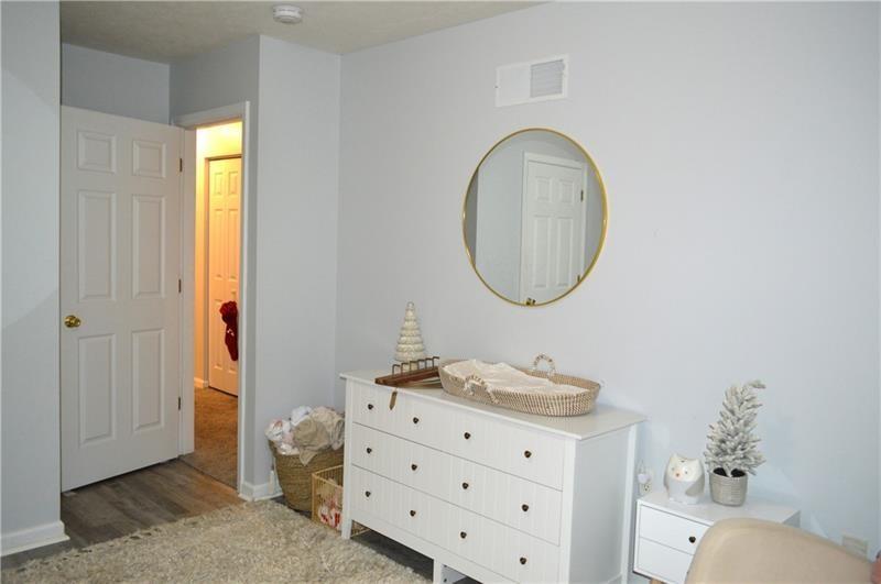 106 Meadowview Drive Renfrew, PA 16053 - Photo 12 of 17 a bathroom with a granite countertop toilet a sink and a mirror