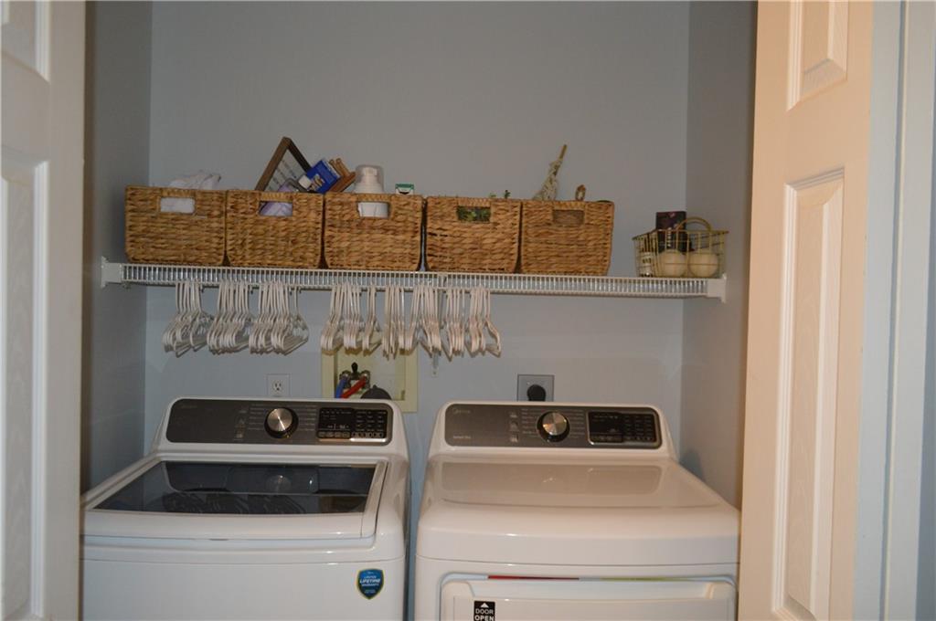 106 Meadowview Drive Renfrew, PA 16053 - Photo 17 of 17 a close view of a stove and a utility room with a sink