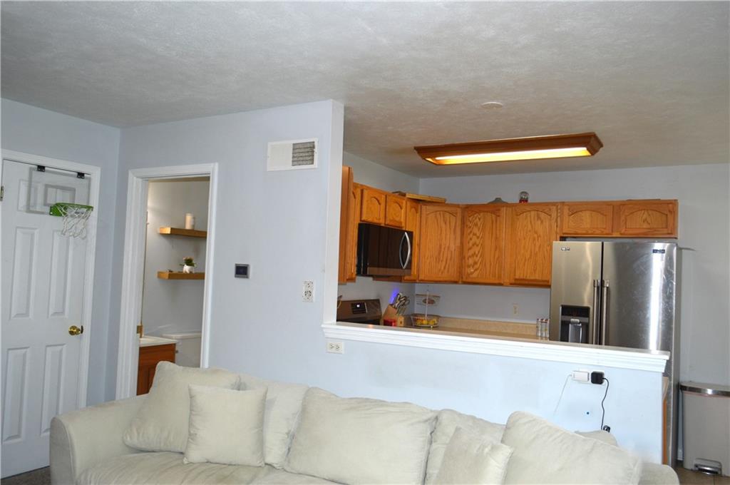 106 Meadowview Drive Renfrew, PA 16053 - Photo 6 of 17 a bathroom with a sink and a mirror