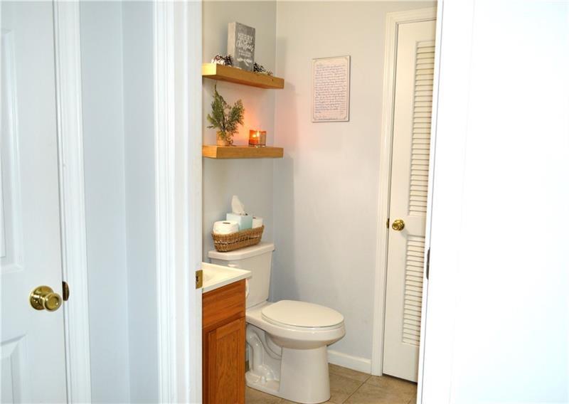 106 Meadowview Drive Renfrew, PA 16053 - Photo 8 of 17 a bathroom with a toilet and a sink