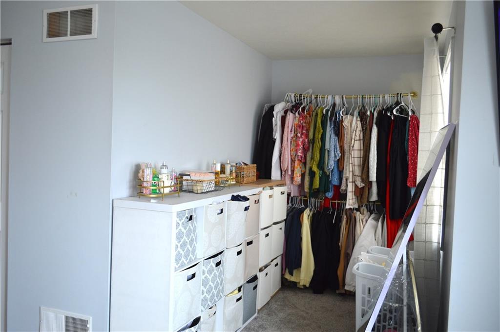 106 Meadowview Drive Renfrew, PA 16053 - Photo 10 of 17 a view of walk in closet with clothes