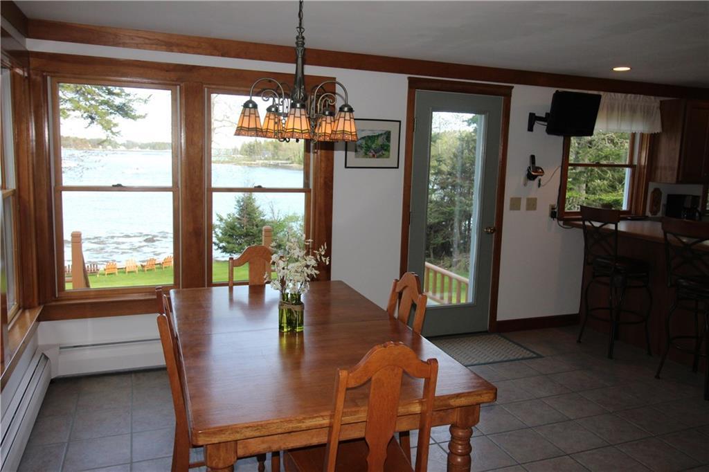 162 Atlantic Quarry Road Spruce Head, ME 04859 - Photo 7 of 33 The dining room opens to a deck...