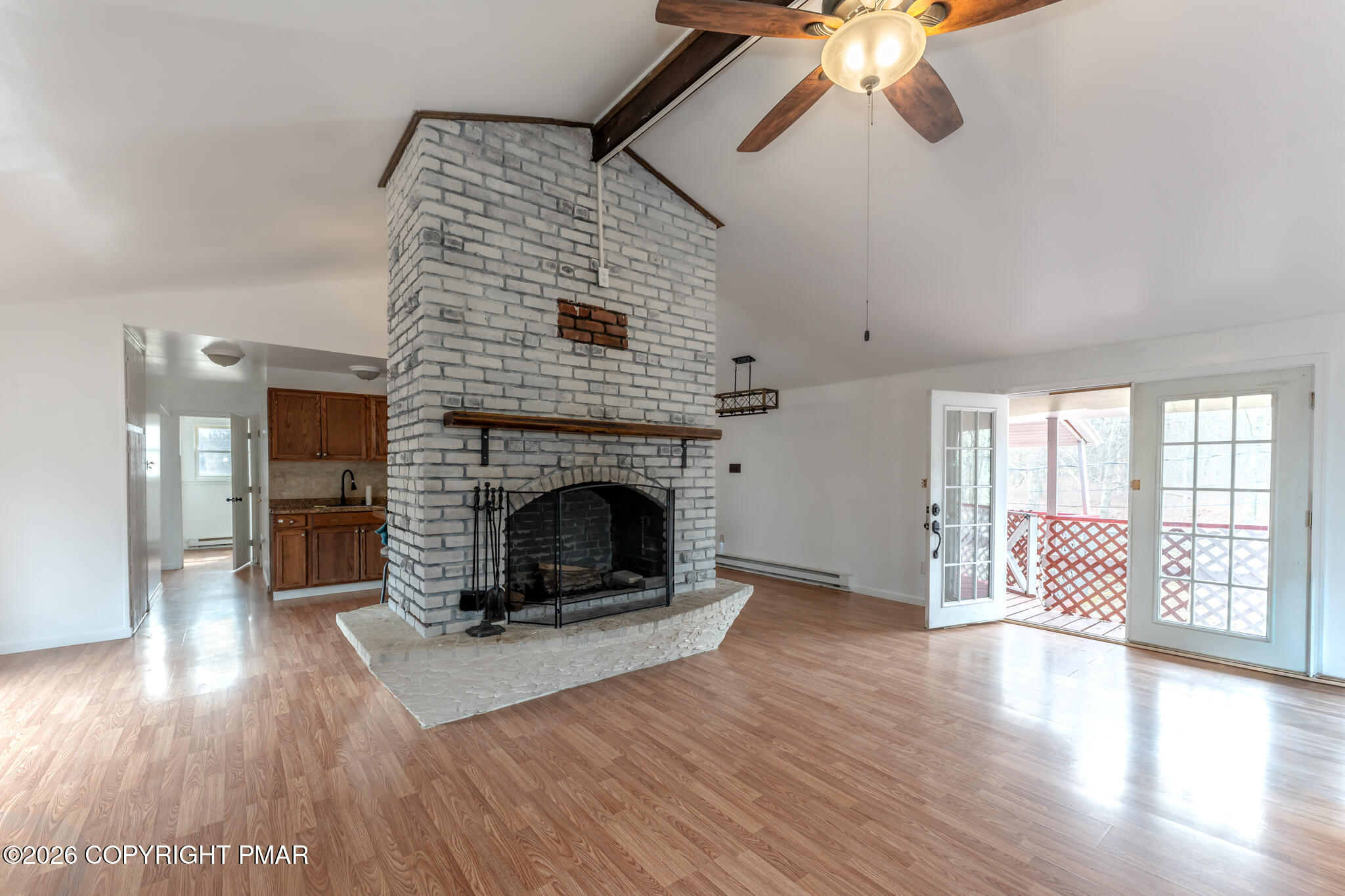484 Mallard Lane Bushkill, PA 18324 - Photo 3 of 60 a living room with furniture and a fireplace