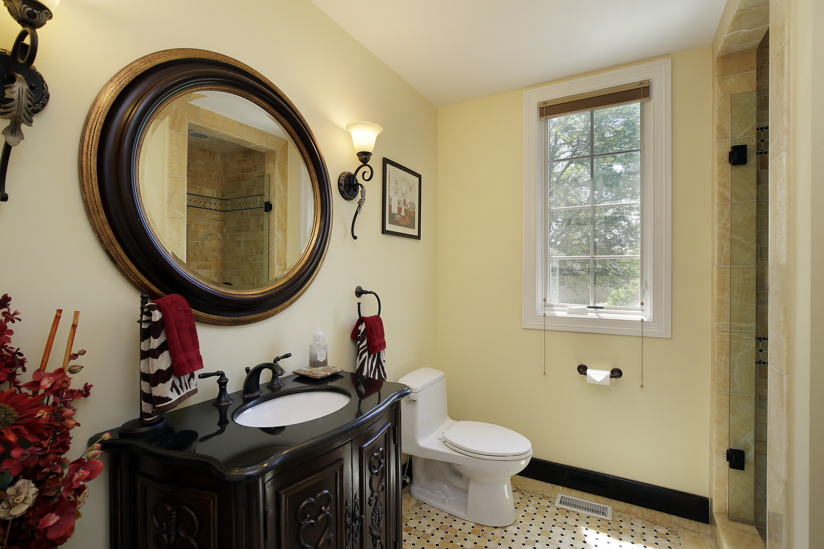 608 Revere Road Glenview, IL 60025 - Photo 12 of 34 a bathroom with a sink and a mirror