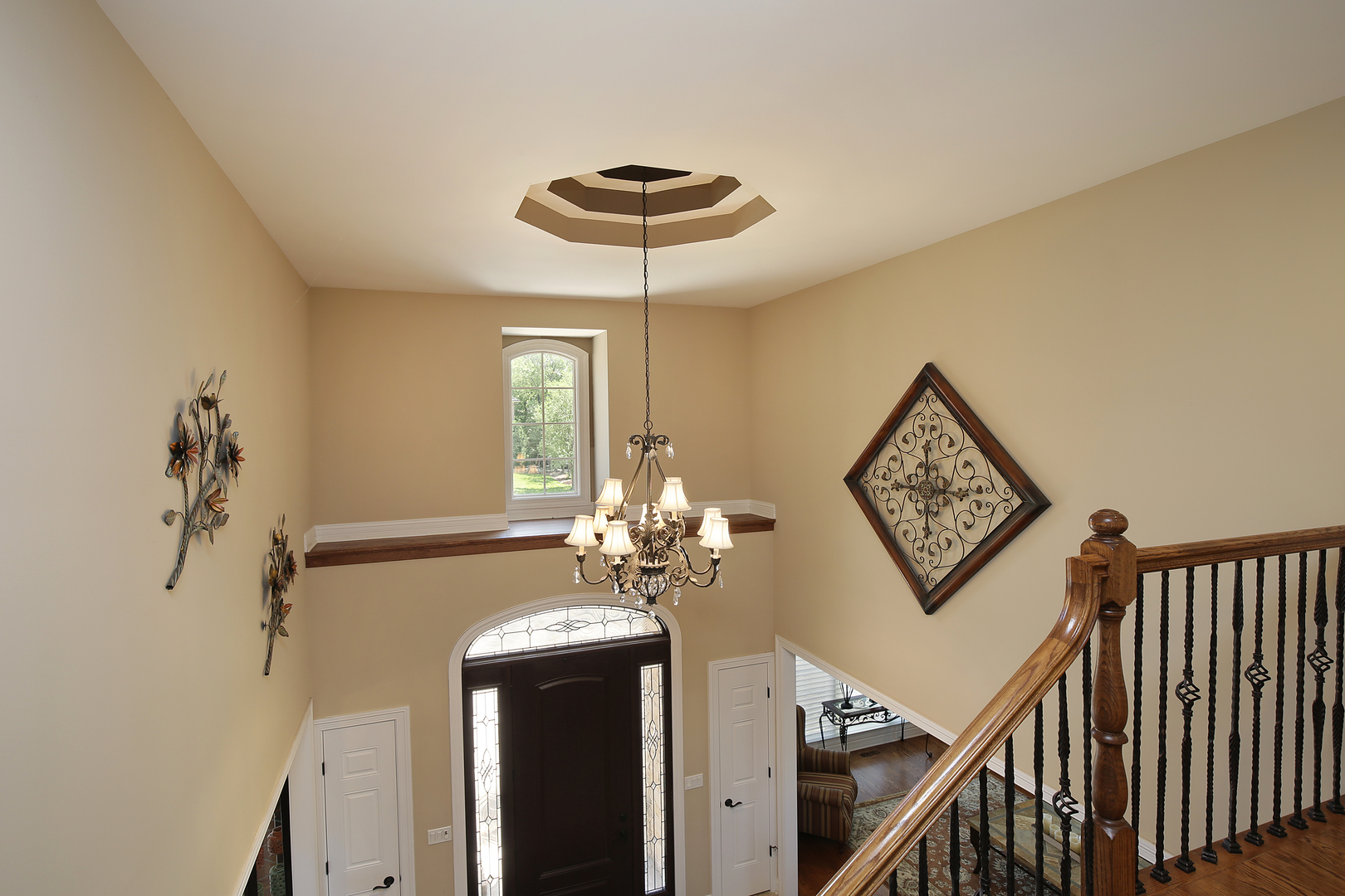 608 Revere Road Glenview, IL 60025 - Photo 3 of 34 a view of a chandelier and dining area a chandelier fan