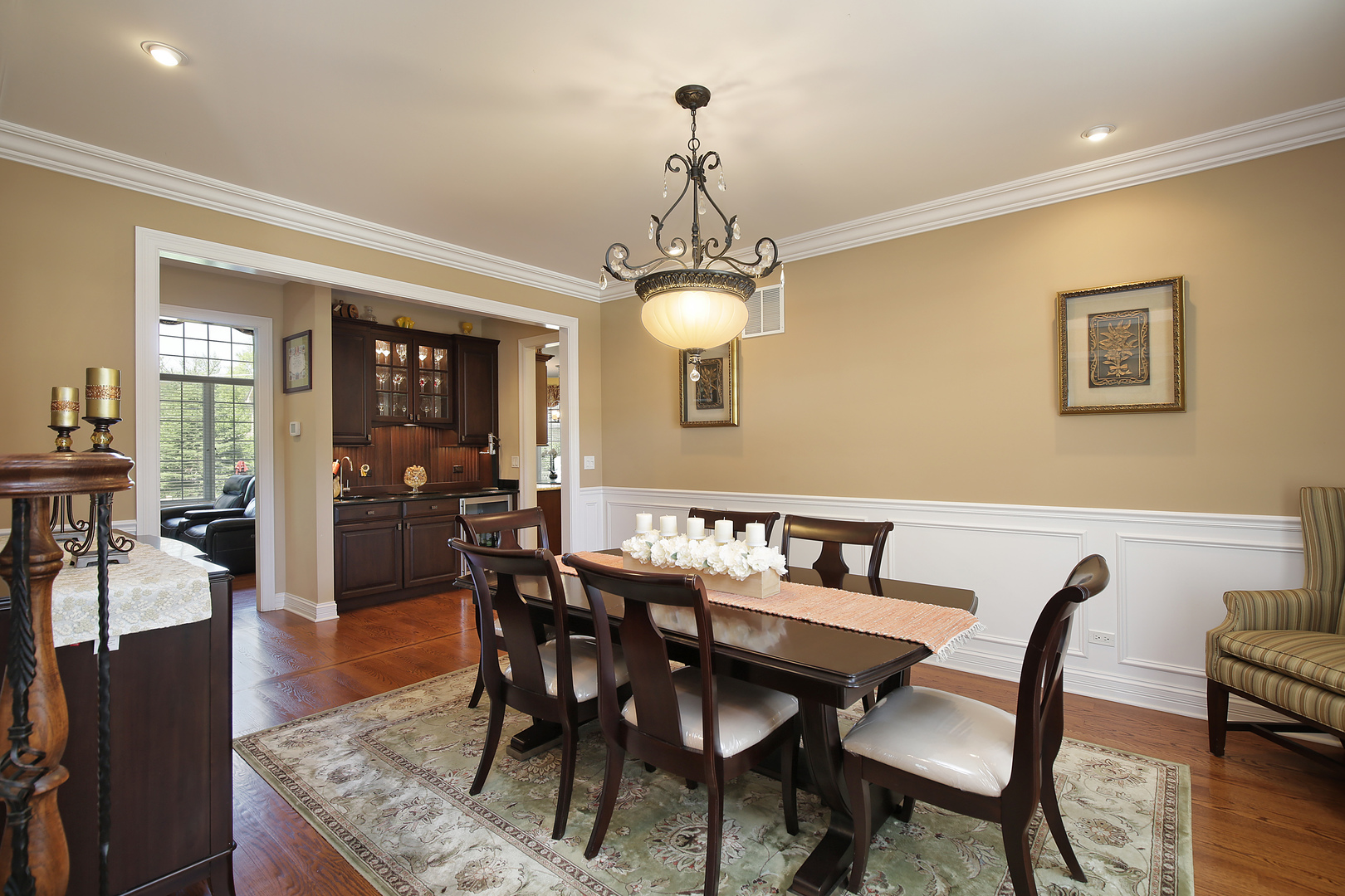 608 Revere Road Glenview, IL 60025 - Photo 9 of 34 a view of a dining room with furniture and wooden floor