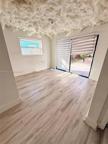 a bathroom with a toilet a sink and a mirror