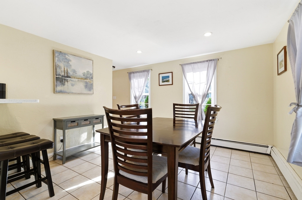 30 Huntington Road Plymouth, MA 02360 - Photo 7 of 35 a view of a dining room with furniture and wooden floor