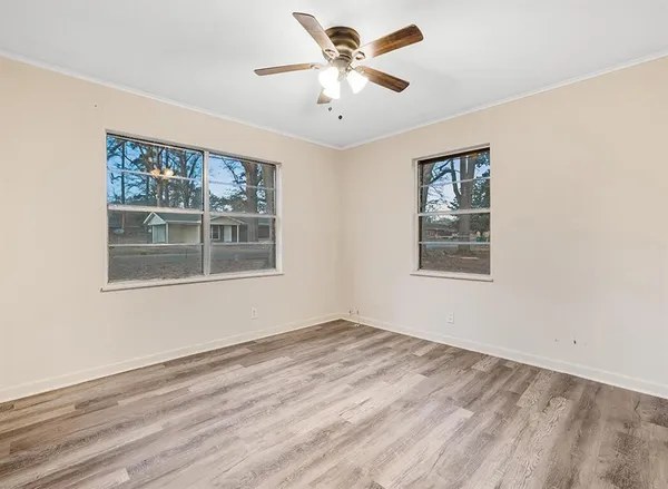 a view of workspace with window and ceiling fan