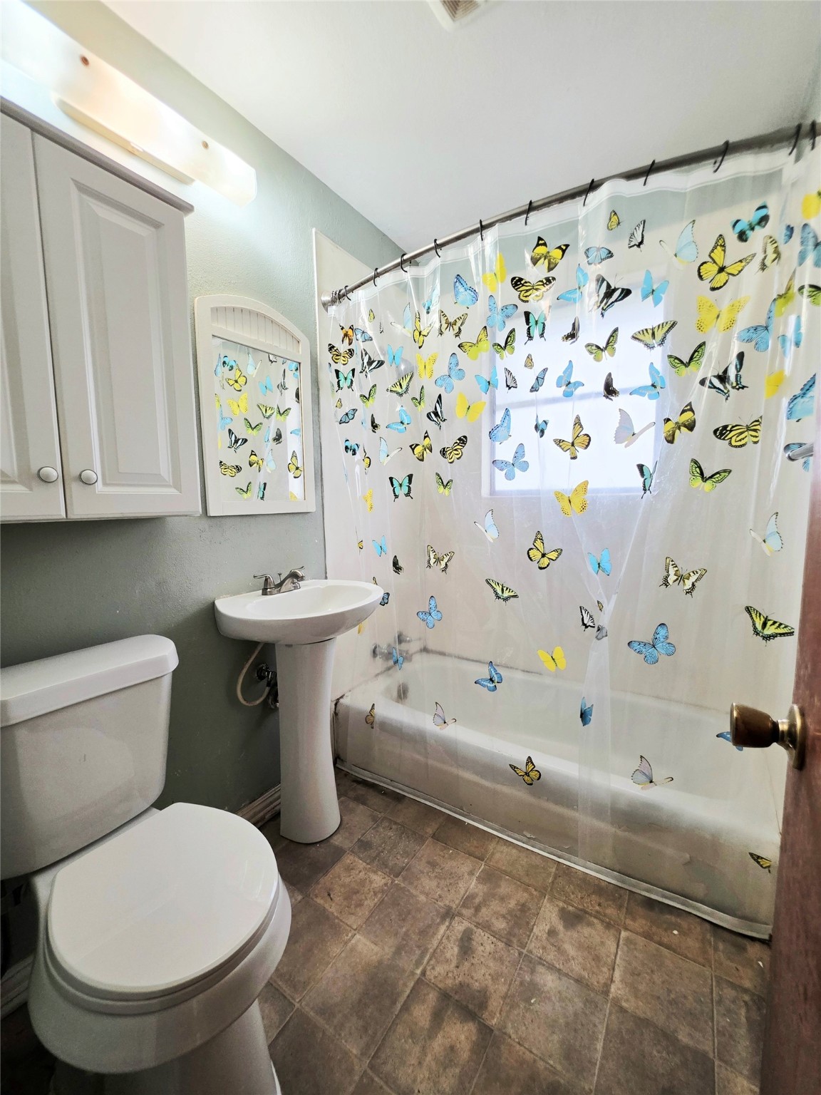 111 South Harvey House Road Somerville, TX 77879 - Photo 15 of 22 a bathroom with a toilet and a sink