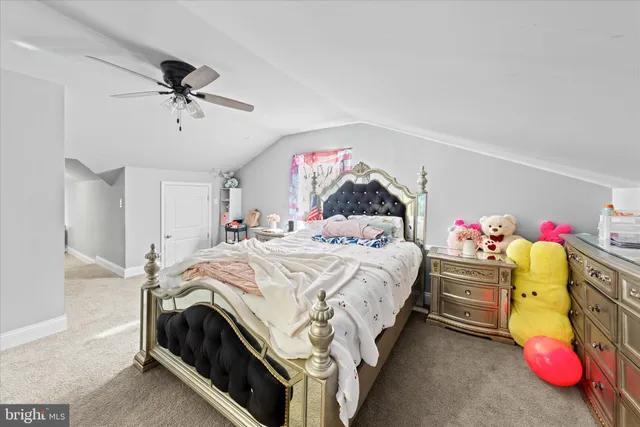 a bathroom with a sink vanity and tub