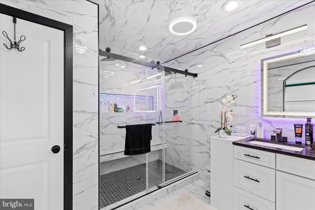 a view of a patio with table and chairs with wooden floor