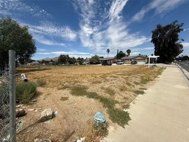 a view of a lake with a yard