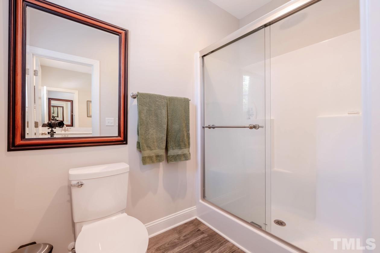 1518 Tom Oakley Road Timberlake, NC 27583 - Photo 25 of 55 a bathroom with a toilet and a shower