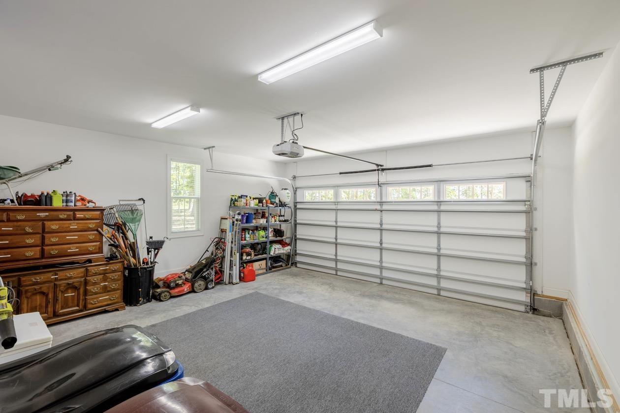 1518 Tom Oakley Road Timberlake, NC 27583 - Photo 31 of 55 a view of a garage with storage