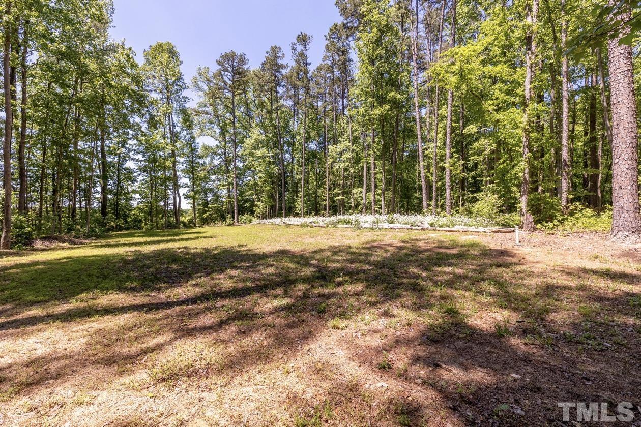 1518 Tom Oakley Road Timberlake, NC 27583 - Photo 37 of 55 a view of outdoor space with trees