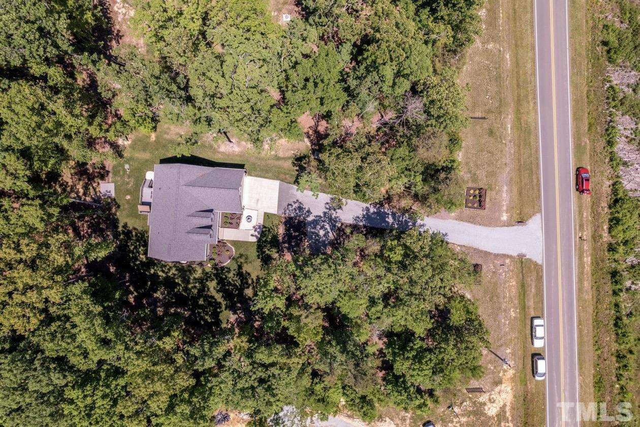 1518 Tom Oakley Road Timberlake, NC 27583 - Photo 48 of 55 an aerial view of a house with a yard