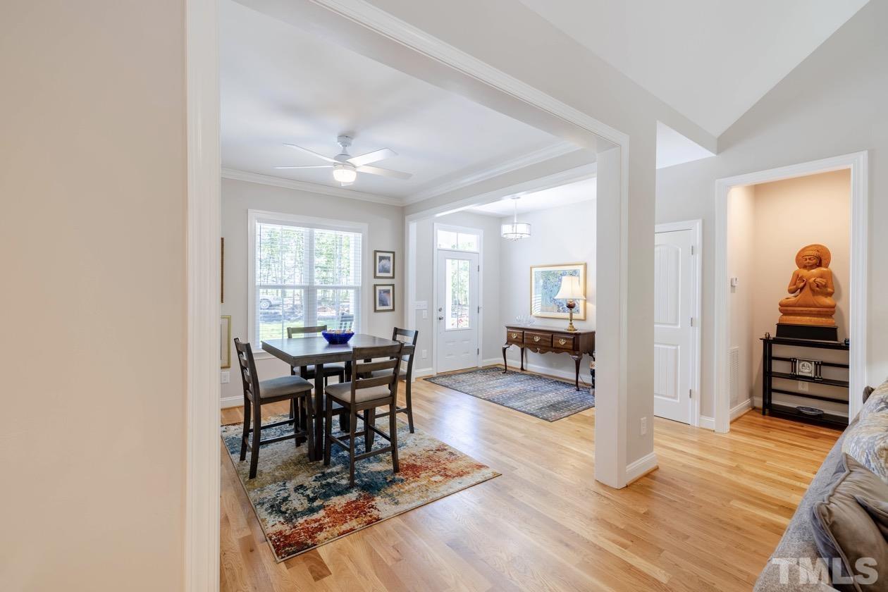1518 Tom Oakley Road Timberlake, NC 27583 - Photo 5 of 55 a living room with furniture and wooden floor