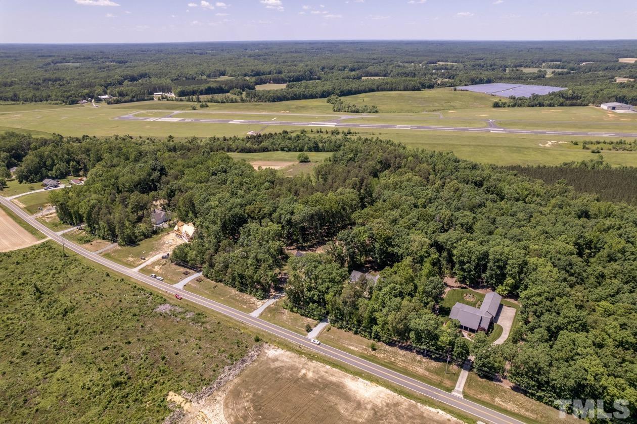 1518 Tom Oakley Road Timberlake, NC 27583 - Photo 53 of 55 a view of an ocean and a mountain